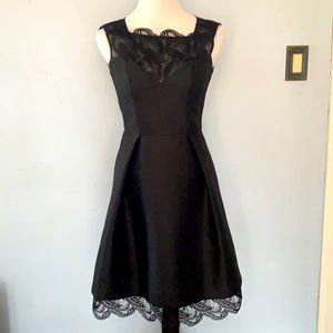 Theia black dress with lace trim and pockets